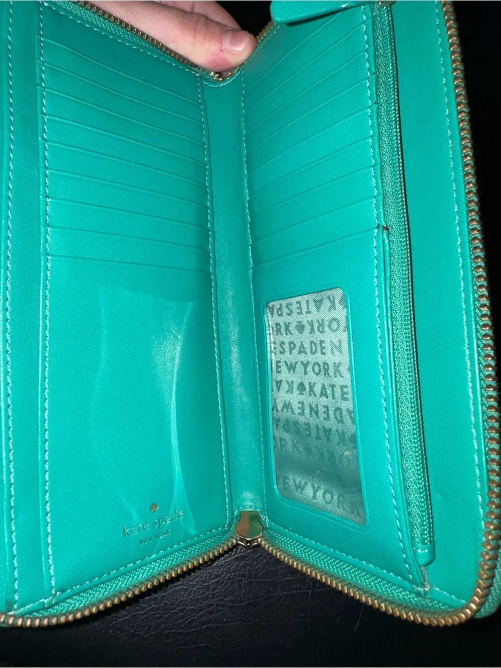 kate spade turquoise zip-around studded wallet